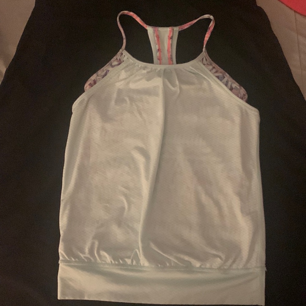 Ivivva size 10 mint green tank with patterned built in bra underneath.